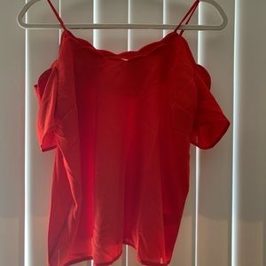 Red blouse with scalloped sleeves